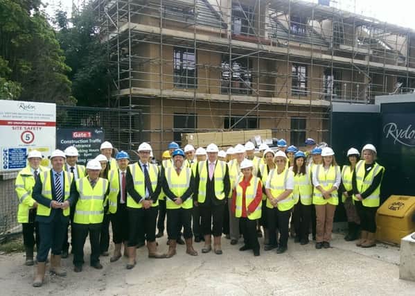 AmicusHorizon staff, residents and dignitaries gather at the topping out ceremony at The Orangery in September SUS-150409-132451001