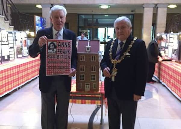 Tristan Mcdonald and Councillor Michael Donin, Mayor of Worthing opening the exhibition SUS-160128-161145001