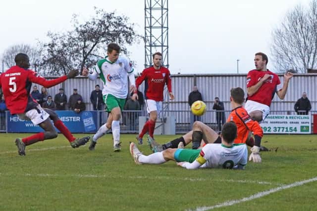 Alfie Rutherford pounces for the only goal / Picture by Tim Hale