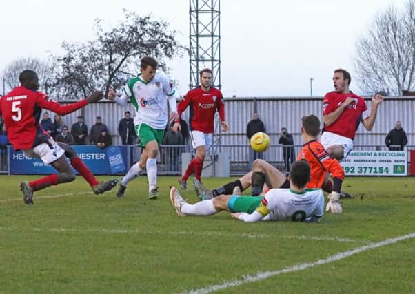 Alfie Rutherford pounces for the only goal / Picture by Tim Hale
