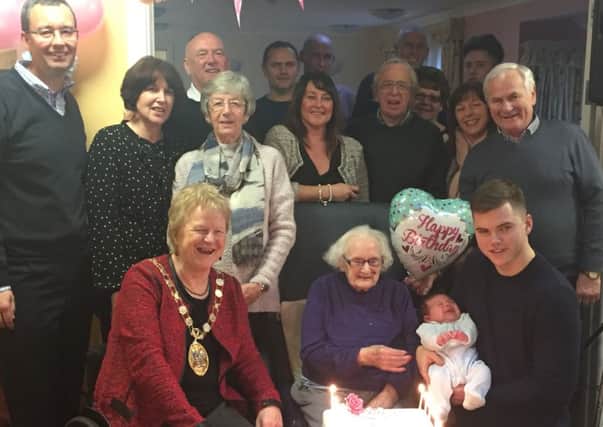 A Crawley resident Lily Leach heralded in her 101st birthday with a party joined by many of her family members, including her newly born great-great-grandson - picture submitted