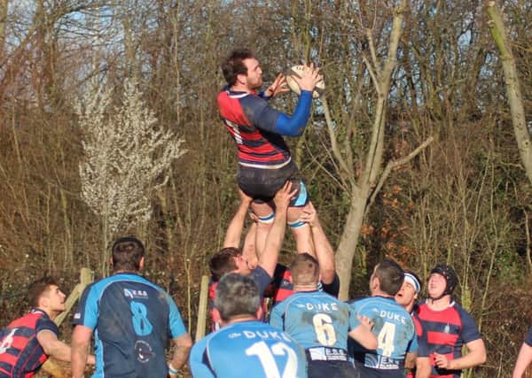 Chi soar to win a lineout at Eton Manor / Picture by Alison Tanner