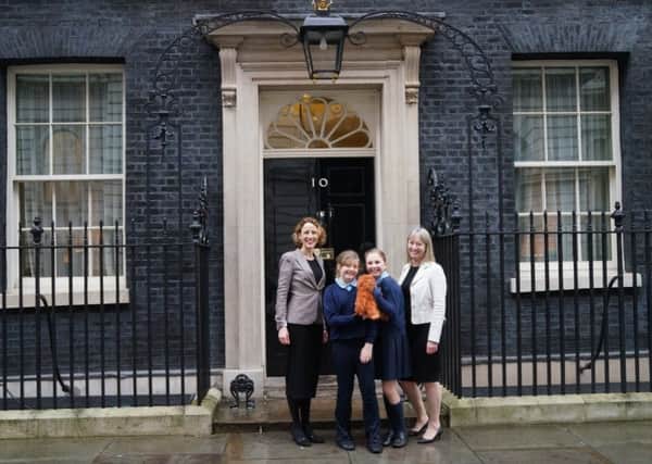 East Preston Junior School teachers and pupils visited 11 Downing Street as part of the Shakespeare Youth Festival. Teachers Judith Crouch Algorta and Sue Tabor with year-six pupils Daisy Cross and Annabel Fincham. Pictured outside 10 Downing Street.