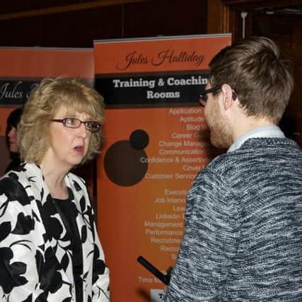 Secret Millionaire Gill Fielding chats to a small business owner at the Better Business show. Pic supplied by Worthing and Adur Chamber of Commerce SUS-160202-141411001