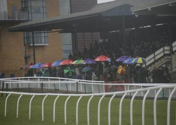 Gloom at Fontwell - they'll be hoping to avoid such scenes when their 2016 programme begins / Picture by Clive Bennett
