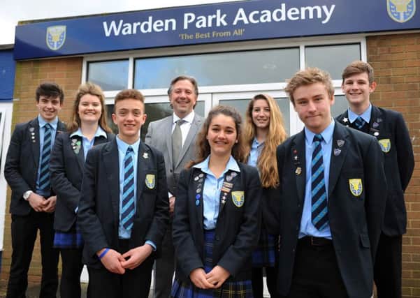 Warden Park Academy head teacher Jonathan Morris pictured with students in 2014. Photo by Steve Robards.