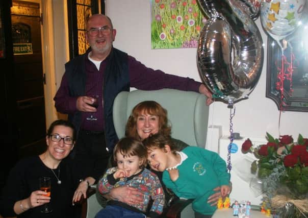 Owner and manager of Valerie Manor in Upper Beeding celebrates her eighth anniversary there. Picture with her two nephews Reuben and Eddie and her mum and dad - picture submitted