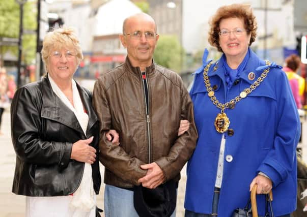 The late Reg Wild with his wife Jean and former mayor Maureen Charlesworth. Photo by Tony Coombes