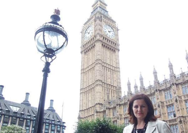 Eastbourne MP Caroline Ansell outside Houses of Parliament SUS-150722-141636001