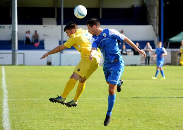 Action from Haywards Heath Town (blue) v Langney Wanderers earlier in the season. Pic Steve Robards SR1521790 SUS-150914-105232001