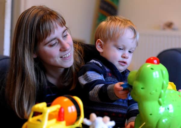 Sophie Venton with her son Alex, nine months