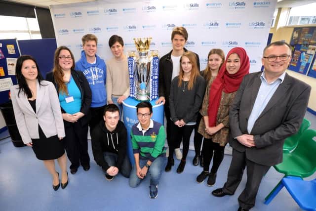 Barclays staff, school teachers and 6th Form students with the trophy. SUS-160302-155638001