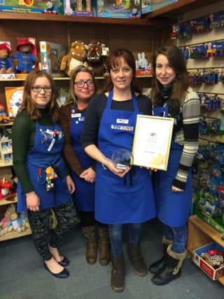 Delight: Toytown staff with the award