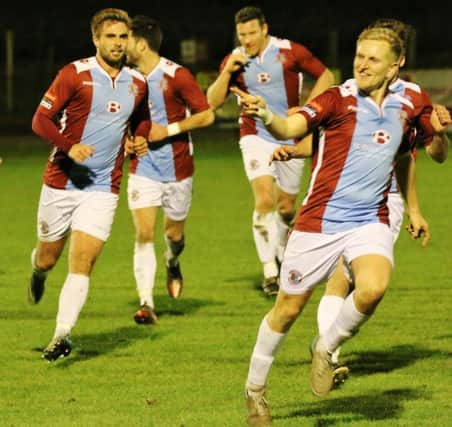 Simon Johnson celebrates his late equaliser for Hastings United against Corinthian-Casuals. Picture courtesy Joe Knight