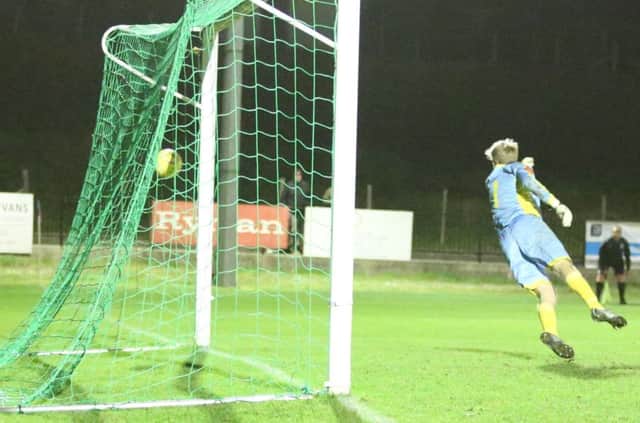 The Corinthian-Casuals goalkeeper is beaten by Simon Johnson's late strike for Hastings United in Tuesday night's 3-3 draw. Picture courtesy Scott White