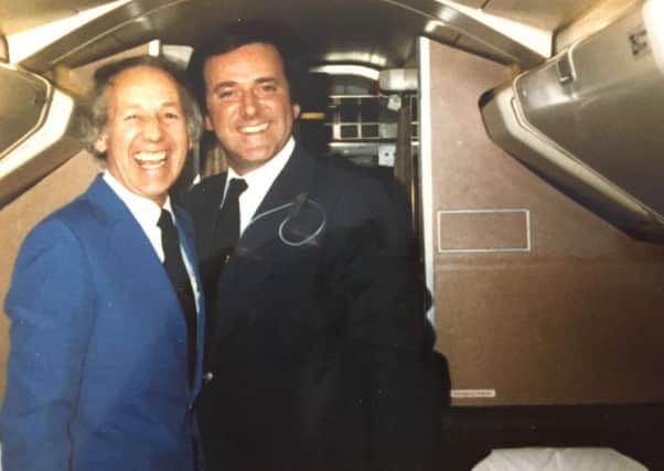 Peter Chadwick with Sir Terry Wogan aboard the Concorde flight in 1982