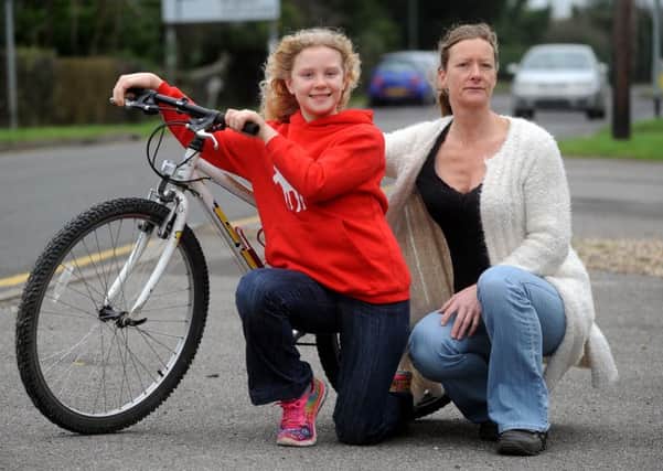 Lisa Scott tells of how daughter Jemima was knocked off bike by car which ran a red light. Pic Steve Robards  SR1603854 SUS-160602-163729001
