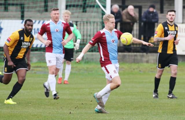 Simon Johnson on the ball for Hastings United during the weekend defeat to Three Bridges. Picture courtesy Joe Knight