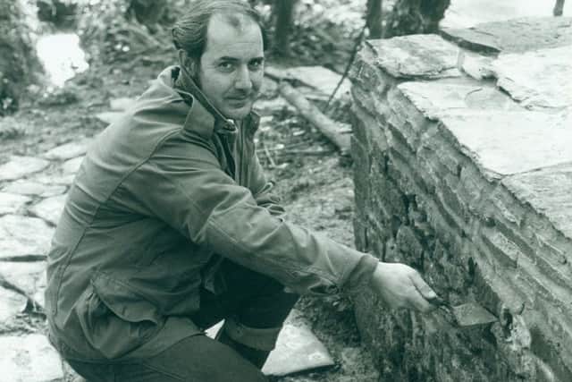 Bob Phillips helping to restore Jacob's Well in Shipley in the 1970s