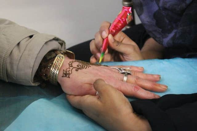 People were given temporary henna tattoos on the day. Photo courtesy of Sussex Police iQXMn9cmn6XWCFzsoepv