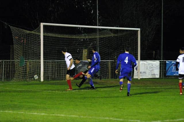 Nick Sullivan hits home YM`s second goal, 2-2. Photo by Clive Turner