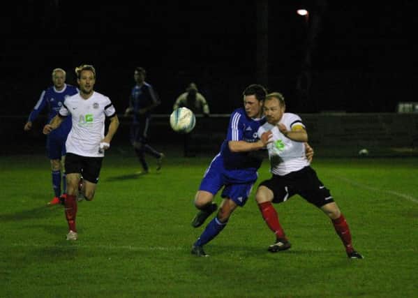 YM`s Ashley Dugdale (right) in action against Jake Holmes