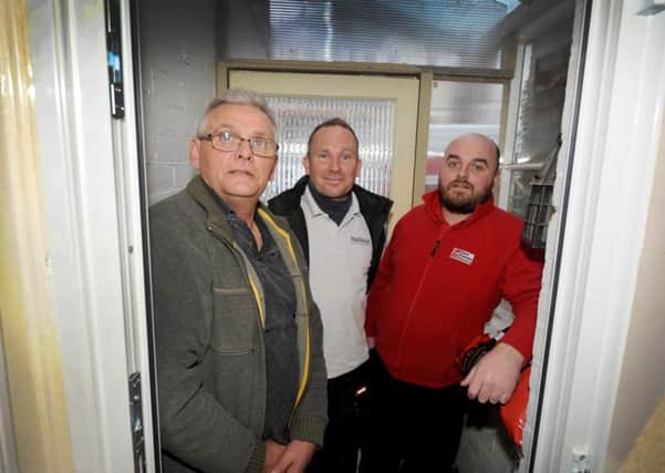 Team Frames donating a new door to the Dawson family in Bexhill.

L-R Andy Dawson, Stuart Johnstone and Joel Ufton. SUS-160126-164013001