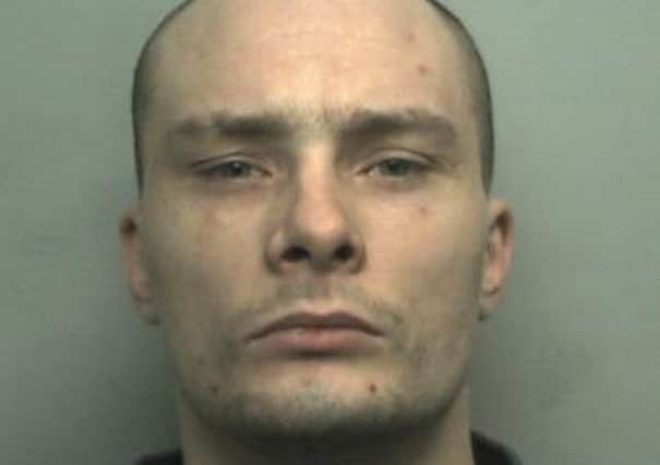 Daniel Simmons is wanted for breaching his licence