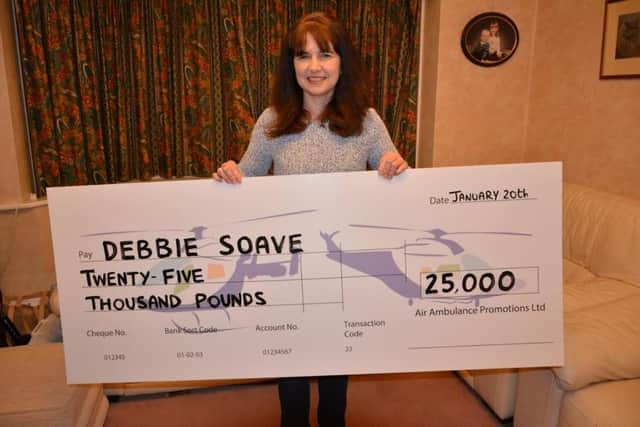 Debbie Soave won the Kent, Surrey and Sussex Air Ambulance lottery. SUS-161002-164631001