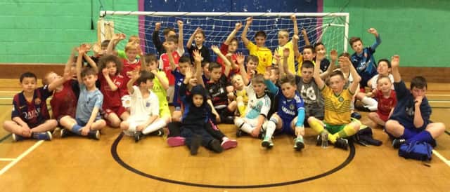 Young players having a ball at a previous holiday course run by Skiltek Football Academy