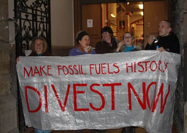 Fossil Free Hastings campaigners outside the town hall before the Hastings Borough Council meeting
