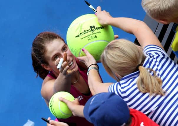 Johanna Konta has greeted the extra attention with a smile
