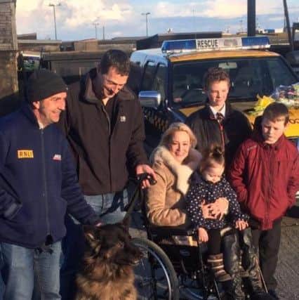 Storm the German Shepherd returns to the RNLI lifeboat station with his family JQzQ-5aa47ettR4Jfi95