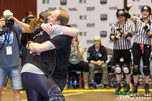 Russ proposes to Michelle at the Roller Derby world cup finals SUS-161202-120506001