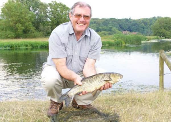 Roger Poole with a chub caught in the Avon in Hampshire