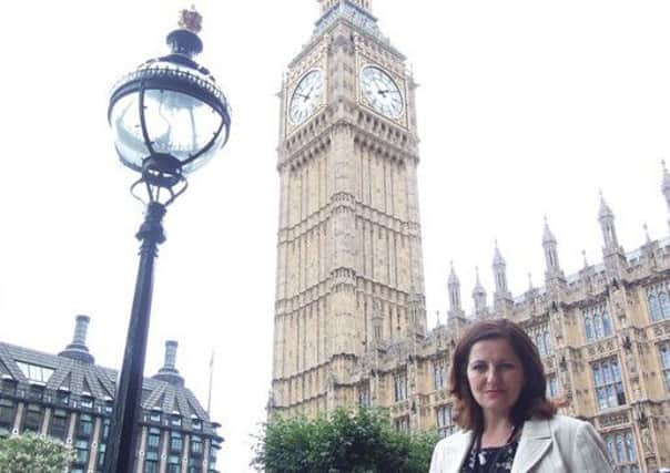 Eastbourne MP Caroline Ansell outside Houses of Parliament SUS-150722-141636001