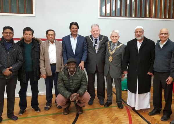 Cllr Abul Azad, Rother District Council Chairman Cllr Jimmy Carroll, Bexhill Town Mayor Cllr Maurice Watson (centre) with members of Bexhill Muslim community. SUS-160217-123448001