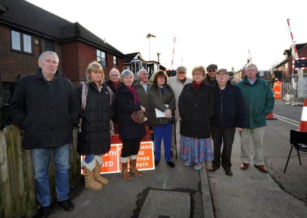 Residents protesting over bright lights at Robertsbridge level crossing. SUS-160216-175824001