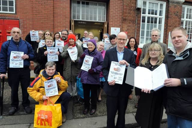 A  petition to keep Bognor Post Office open was presented to MP Nick Gibb, centre, by Paul and Marion Wells, right.ks1600045-1