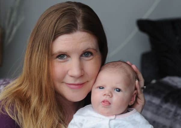 Katie Farrant and her daughter six week old Isla (Photo by Jon Rigby) SUS-160215-104910008
