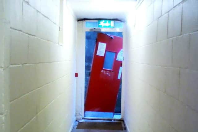 The door at Wyvern House before it was fixed. Photo courtesy of Mary Hawk