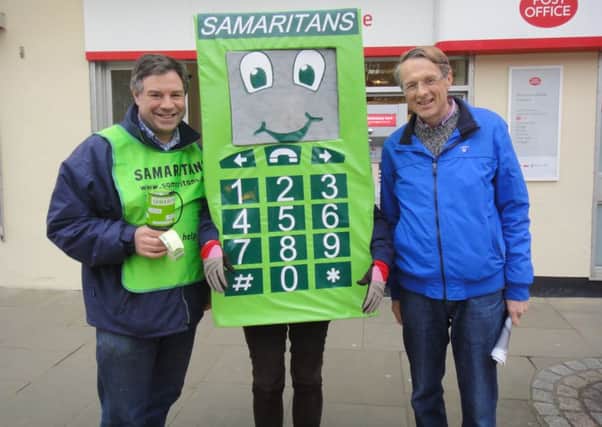 Jeremy Quin with Samaritans mascot and Canon Guy Bridgewater, Vicar of Horsham - picture submitted