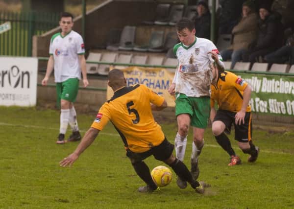 Alfie Rutherford gets forward for Bognor at East Thurrock / Picture by Tommy McMillan