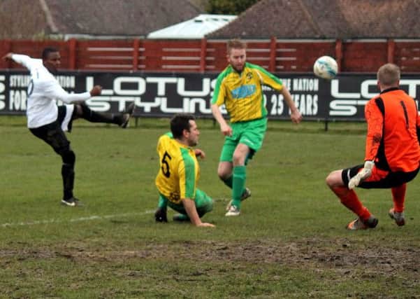 Terrell Lewis strikes for Pagham / Picture by Roger Smith