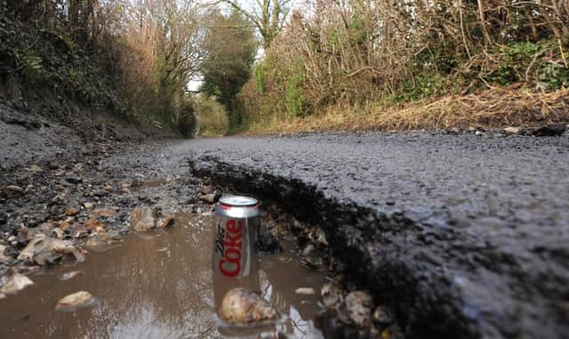 Potholes in the Midhurst area pictured in 2013