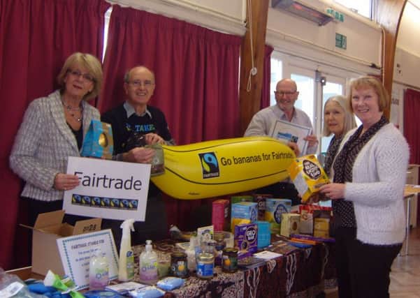 Jack Doherty and Alan Bearne of Bexhill Fairtrade Town Committee with early Easter eggs at a WI meeting
