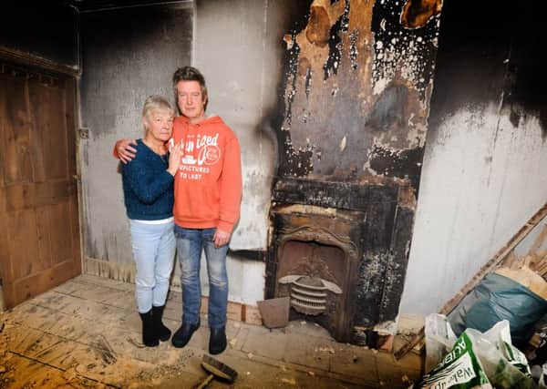 Tenants Julie Williams and Dom Higham after the fire at the Inkerman Arms, Rye Harbour SUS-160222-142919001
