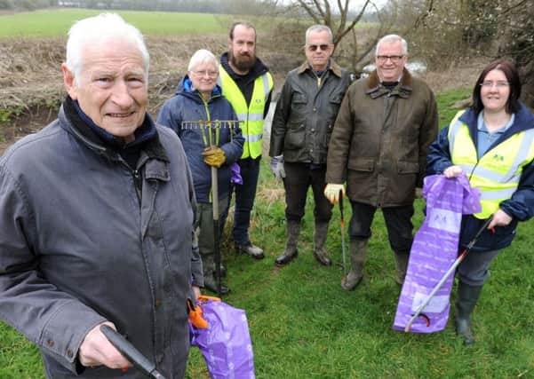 "Clean for the Queen initiative to clear rubbish along the bank of the River Mole. Pic Steve Robards  SR1607559 SUS-160703-111241001