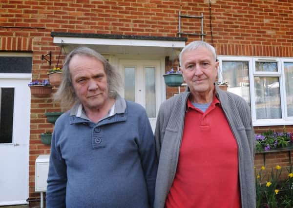 Roy (right) and Kevin Newport being forced to leave their house after their mother died