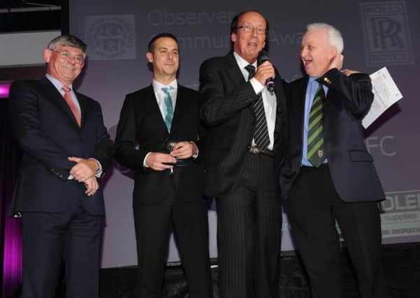 Jack Pearce (right) with Fred Dinenage and the club's Simon Cook and Darin Killpartrick at an Obsver awards ceremony